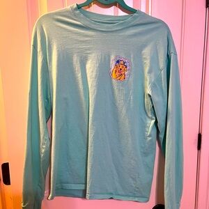 Blue/green Game Day long sleeve size medium. Never worn without tags